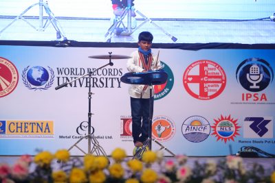 Raviram Anbumani - showing his drumming antics on the stage in the Indian Record Holders At World Stage 2017