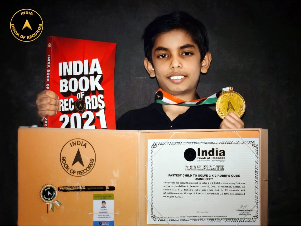 Fastest child to solve 2 x 2 Rubik’s cube using feet India Book of