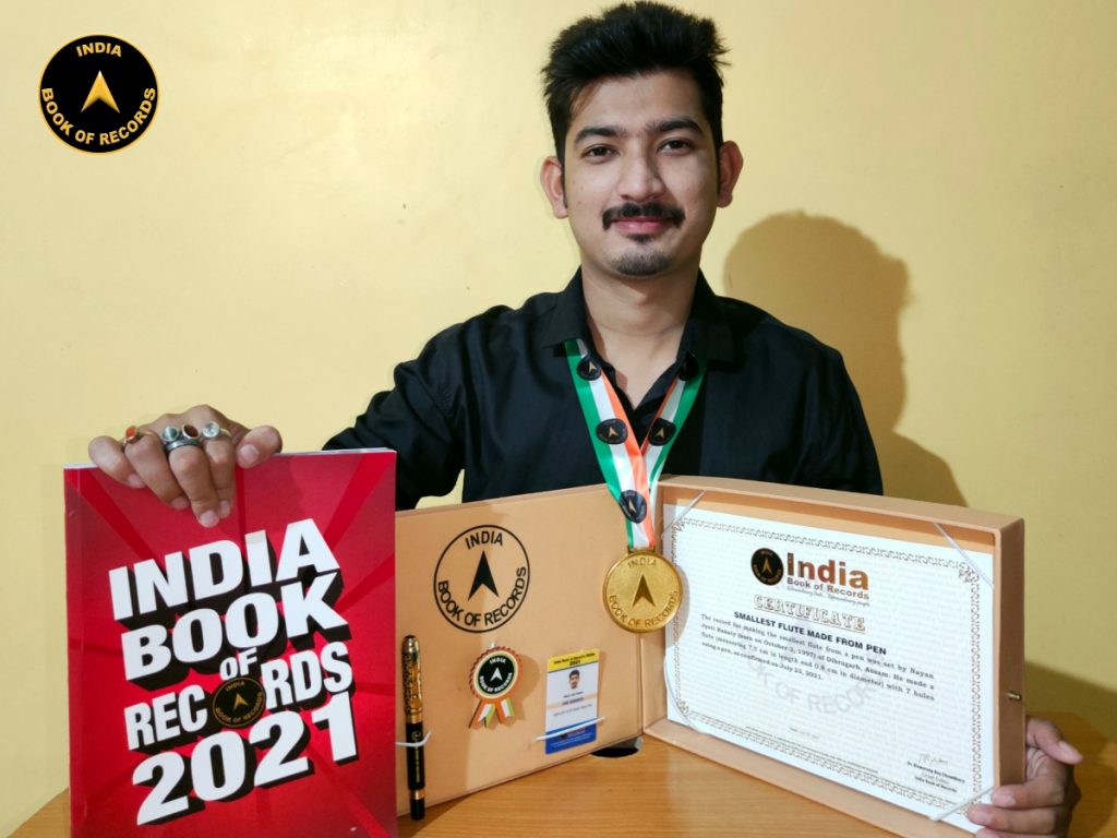 Smallest flute made from pen India Book of Records