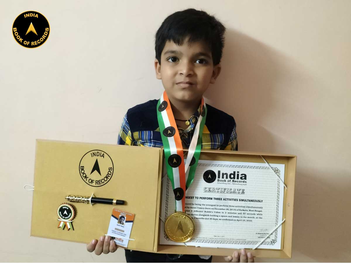 Youngest to perform three activities simultaneously