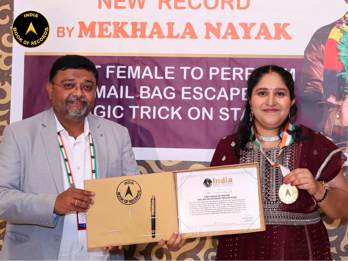 First female to perform mail bag escape magic trick on stage