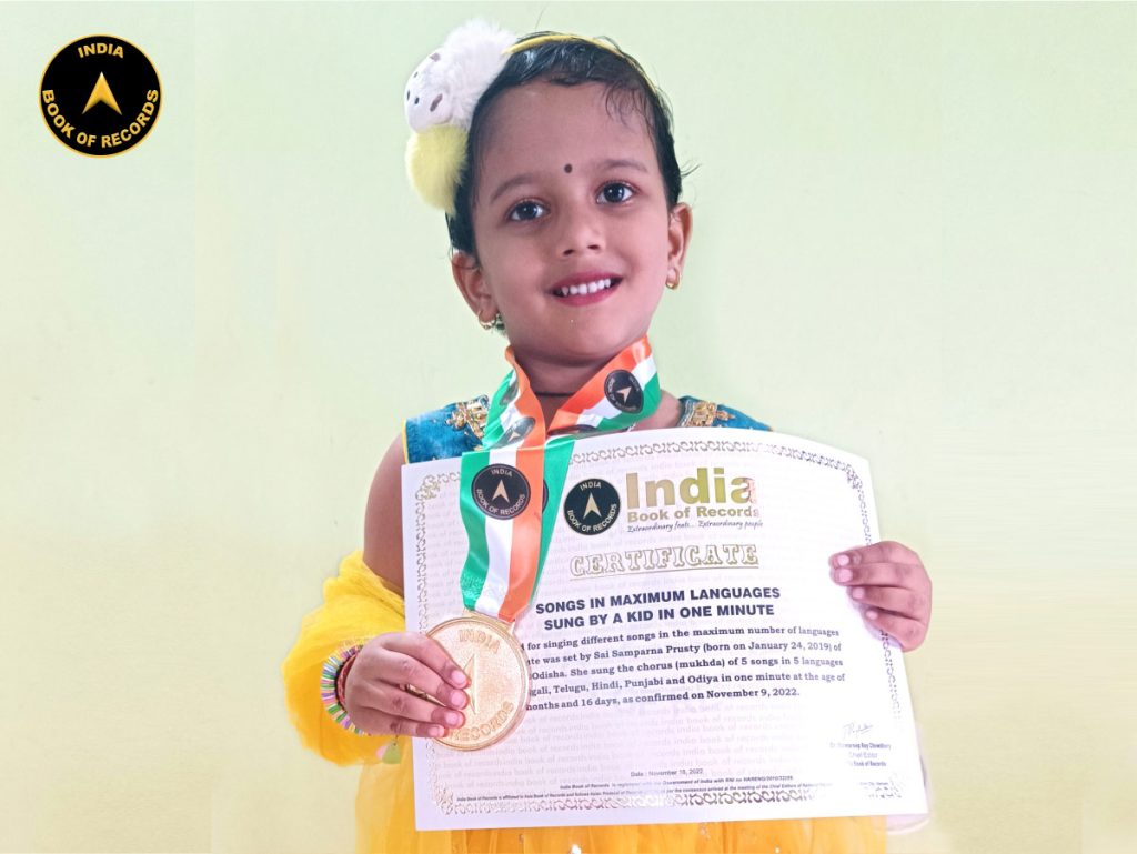Songs in maximum languages sung by a kid in one minute India Book of
