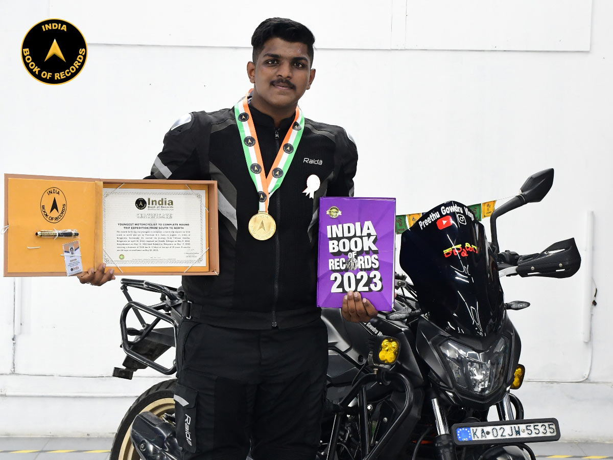 Youngest motorcyclist to complete round trip expedition from south to north