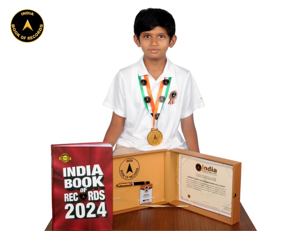 Largest paper cup pyramid made by a child - India Book of Records