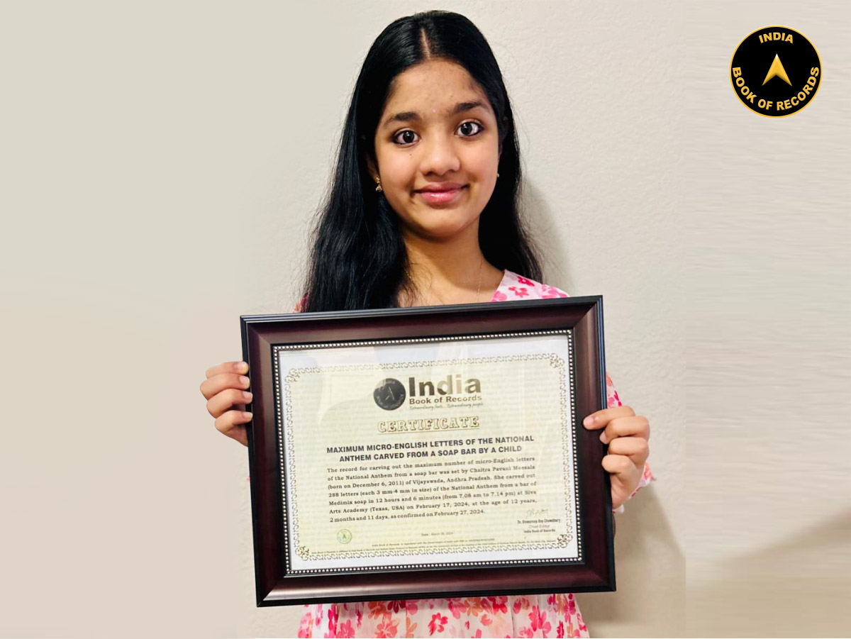 Maximum micro-English letters of the National Anthem carved from a