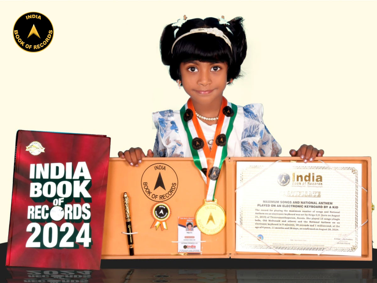Maximum songs and National Anthem played on an electronic keyboard by a kid