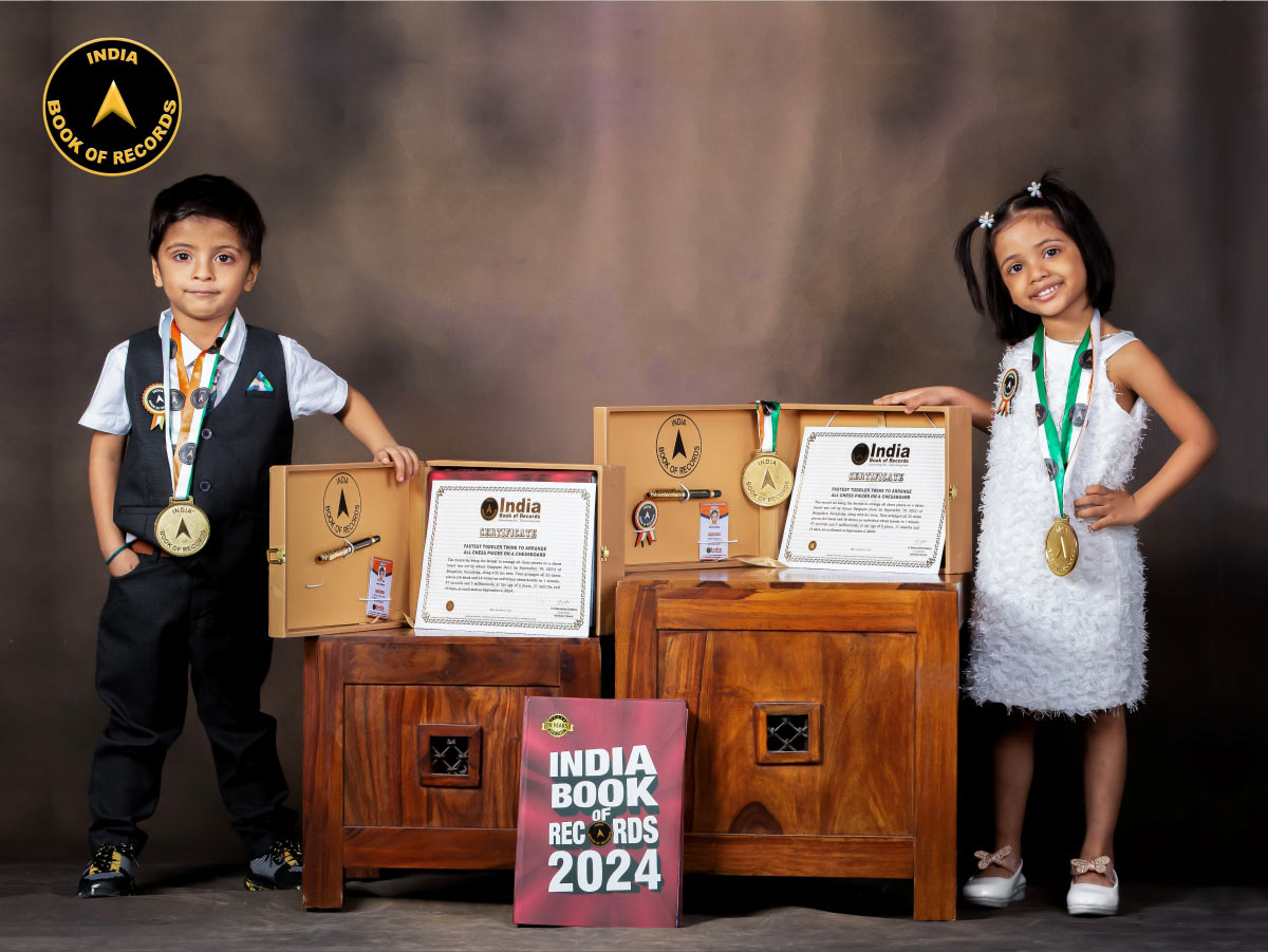 Fastest toddler twins to arrange all chess pieces on a chessboard