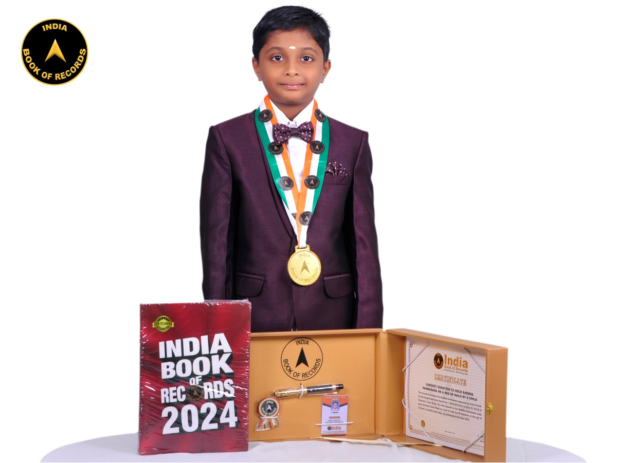 Longest duration to hold Baddha Padmasana on a bed of nails by a child