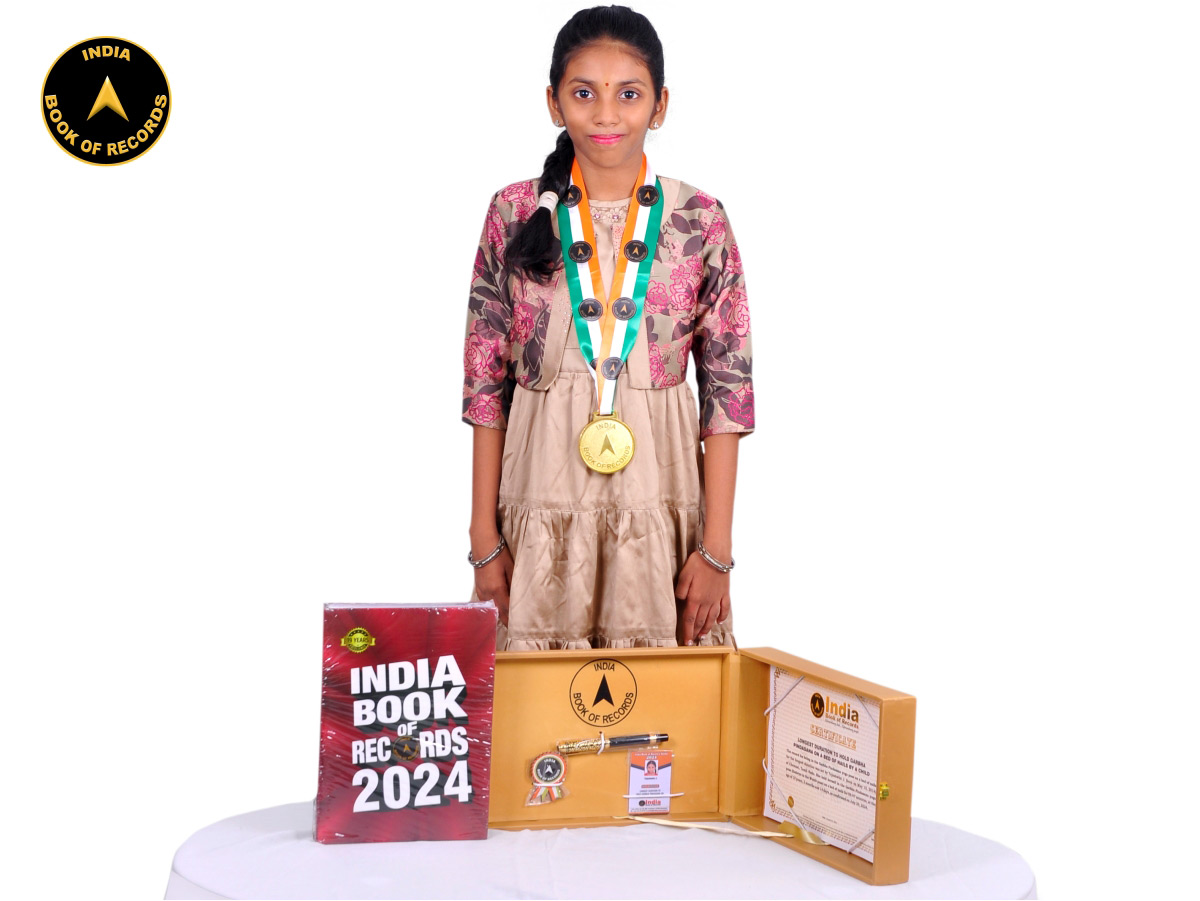 Longest duration to hold Garbha Pindasana on a bed of nails by a child