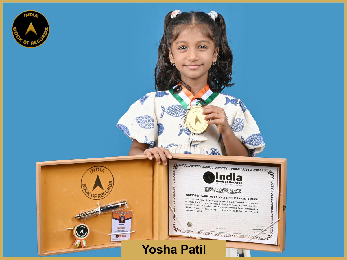 Youngest twins to solve a single Pyramid Cube