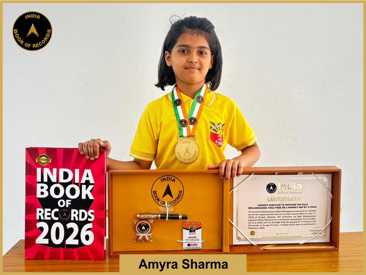 Longest duration to perform the Raja Bhujangasana yoga pose on a monkey bar by a child