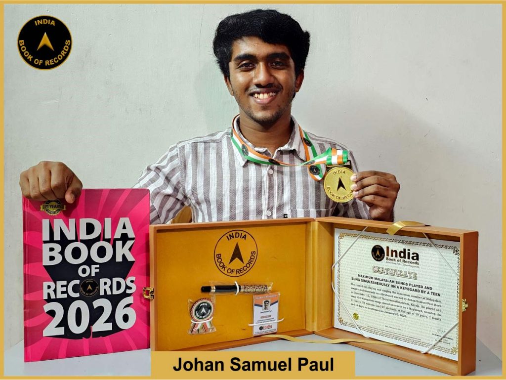 Maximum Malayalam songs played and sung simultaneously on a Keyboard by a teen