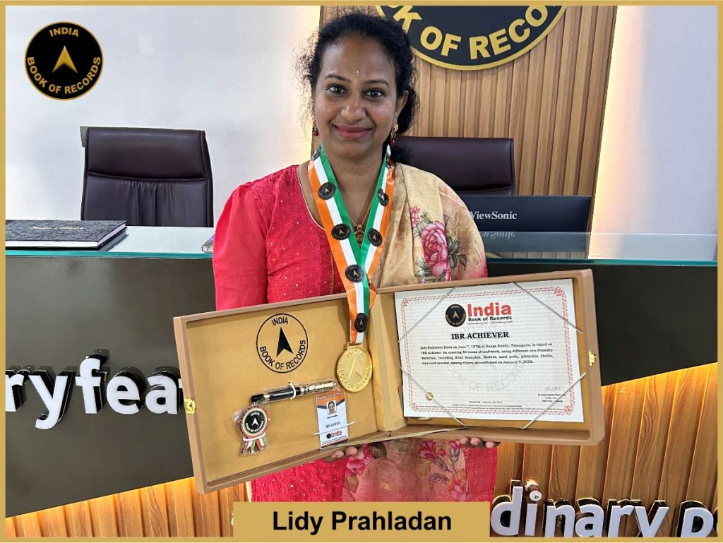 Omage of Lidy Prahladan with IBR Achiever certificate.