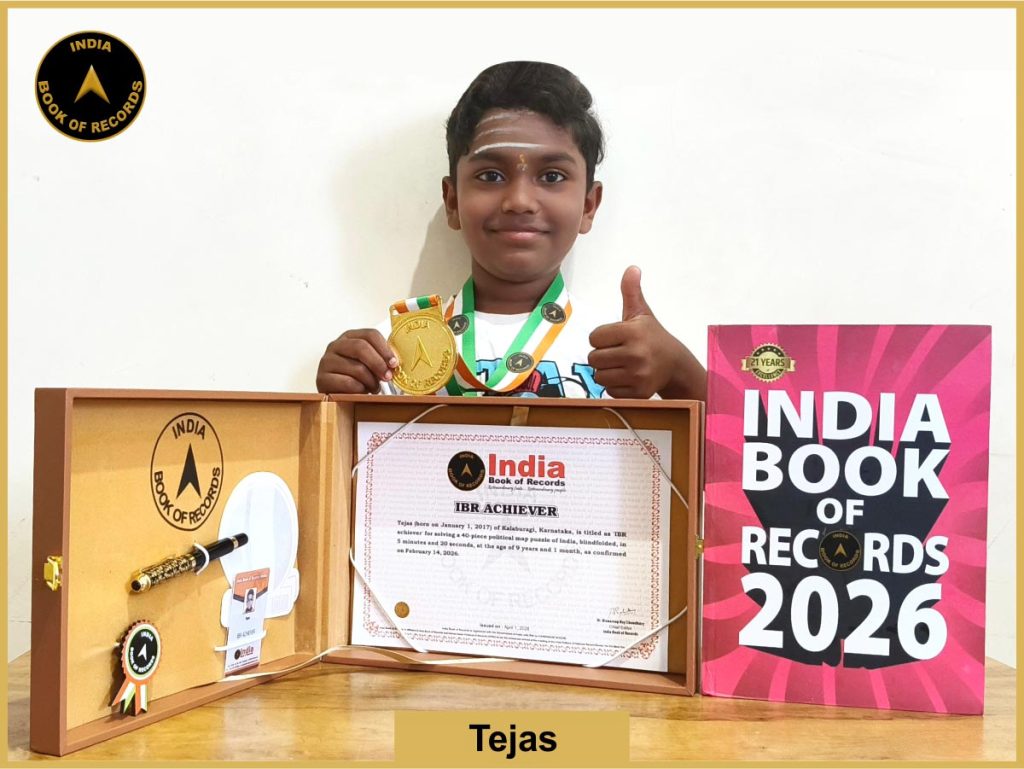 Pic of Tejas with IBR Achiever certificate.