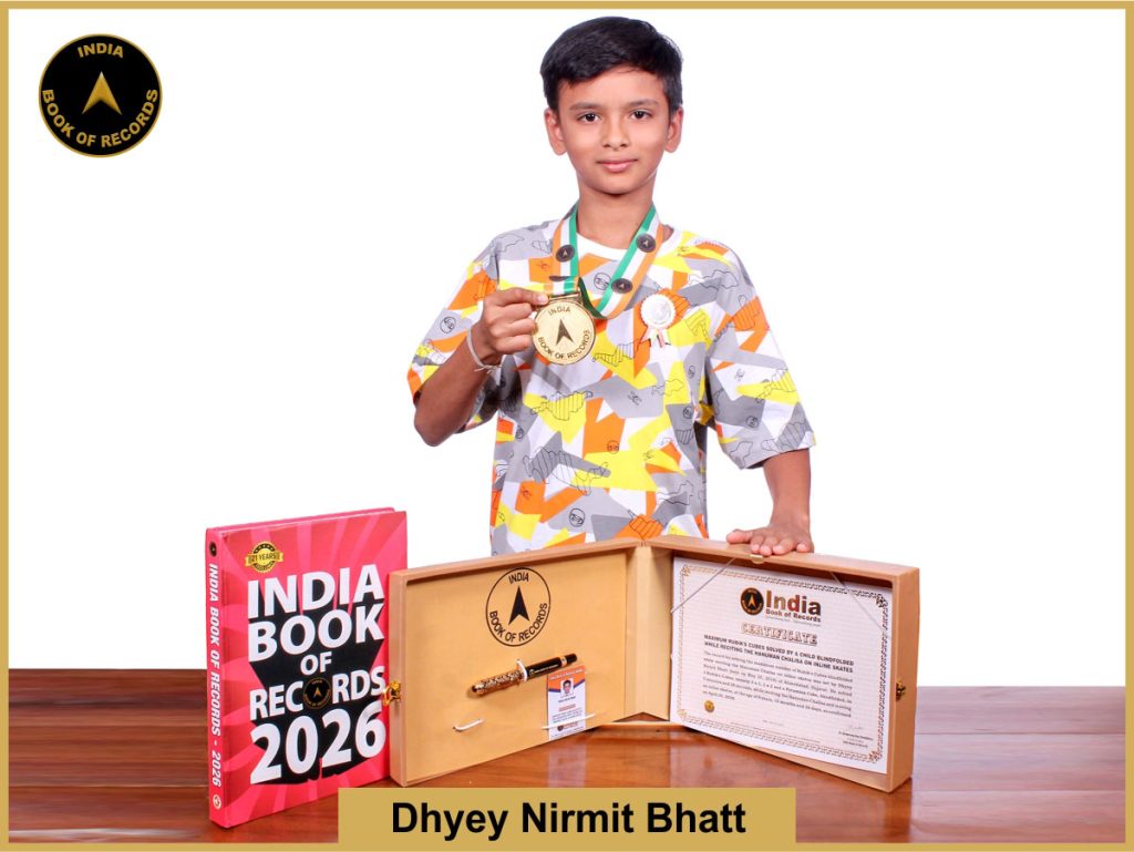 Image of Dhyey Nirmit Bhatt, Maximum Rubik's Cubes solved by a child blindfolded while reciting the Hanuman Chalisa on inline skates.