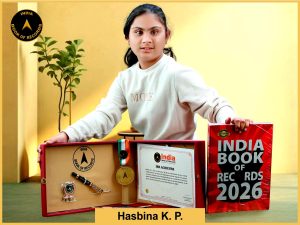 Image of Hasbina K. P. with IBR Certificate.