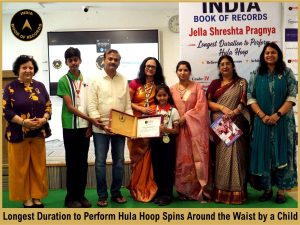 Longest Duration to Perform Hula Hoop Spins Around the Waist by a Child.