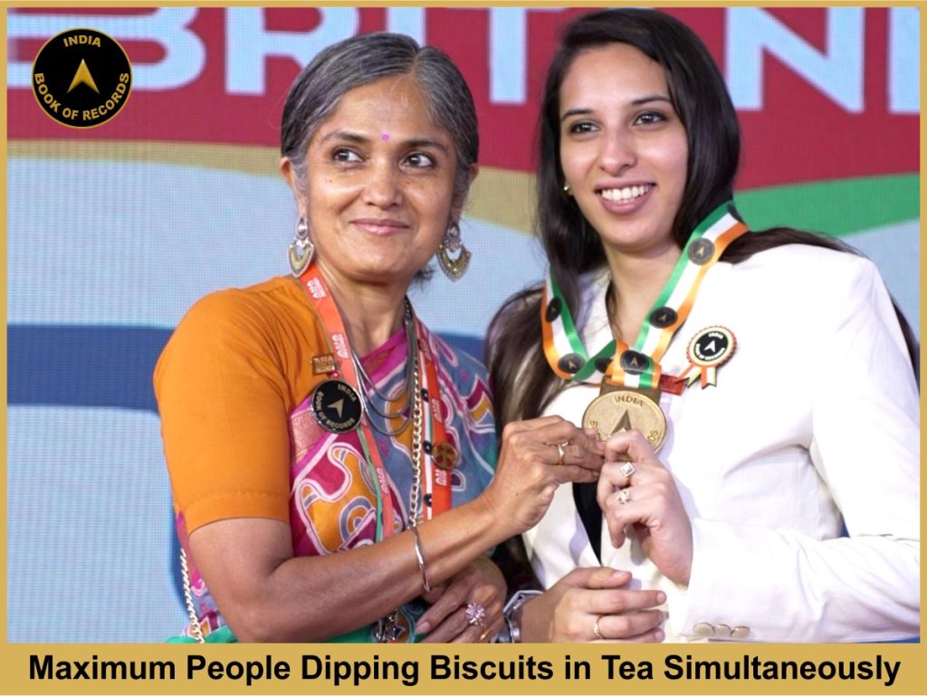 Maximum People Dipping Biscuits in Tea Simultaneously.