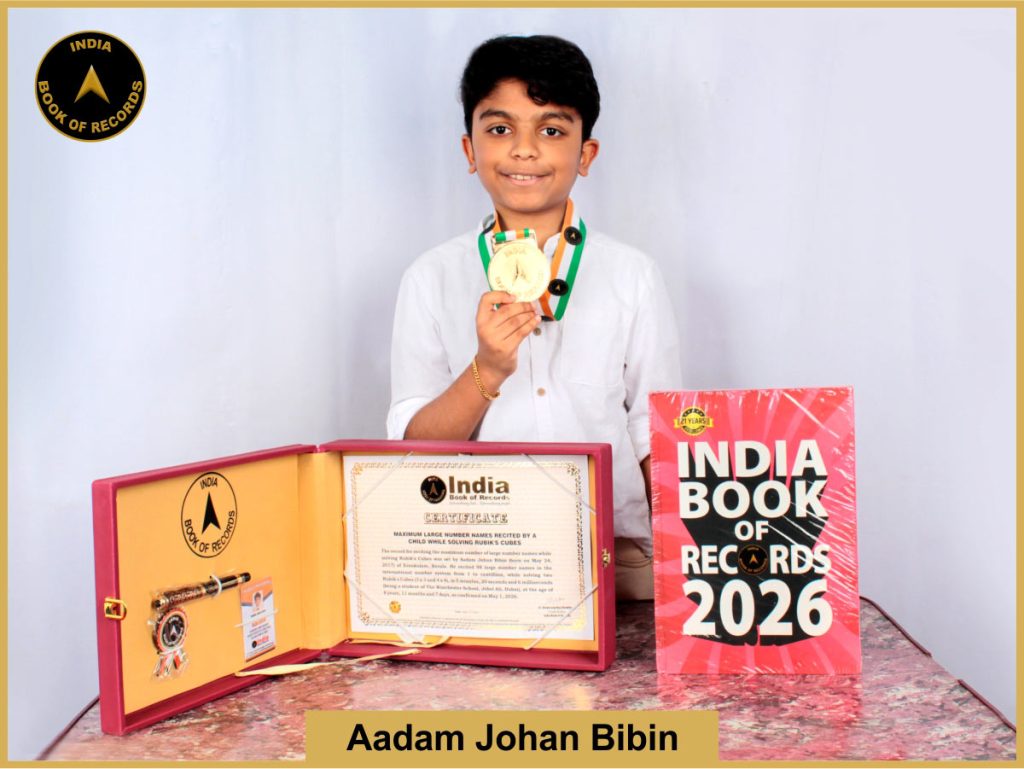 Image of Aadam Johan Bibin, Maximum large number names recited by a child while solving Rubik’s Cubes.