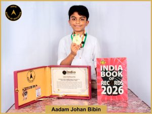 Image of Aadam Johan Bibin, Maximum large number names recited by a child while solving Rubik’s Cubes.