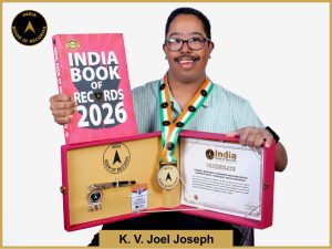 Pic of K.V Joel Joseph, Longest duration to perform Panchari Melam Arangettam by a specially abled individual.