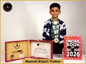 Pic of Maahish Brijesh Thakkar, Fastest child to solve 50 single-digit addition and subtraction sums using Abacus technique.
