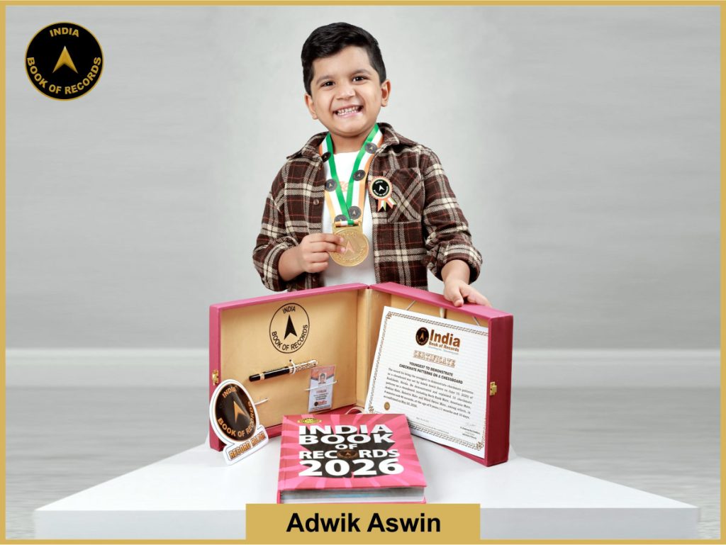 Pic of Adwik Aswin, Youngest to demonstrate checkmate patterns on a chessboard.