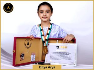 Image of Ditya Arya, Maximum hula hoop spins performed around both elbows by a child in one minute while walking forward and backward.