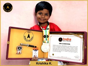 Image of Krishika K. with IBR Achiever certificate.