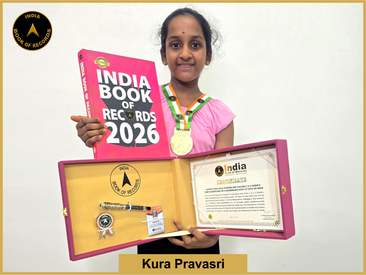 Fastest child hula hooping and solving 2 x 2 Rubik’s Cube blindfolded on a hoverboard with lit diya on head