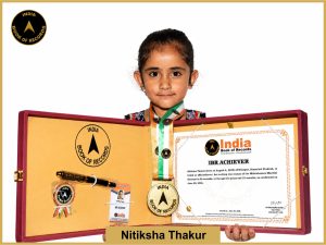 Image of Nitiksha Thakur with IBR Achiever certificate.