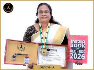 Image of Santha B, Maximum handwritten replicas of religious books in multiple languages made by a sexagenarian.