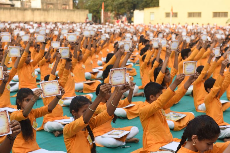 Group writing of Bhagavad Gita shlokas