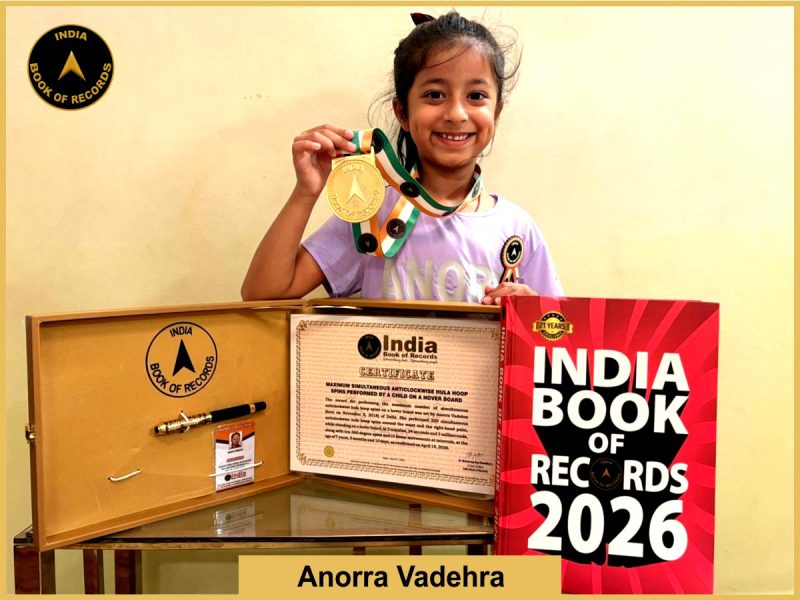 Image of Anorra Vadehra, Maximum simultaneous anticlockwise hula hoop spins performed by a child on a hover board.