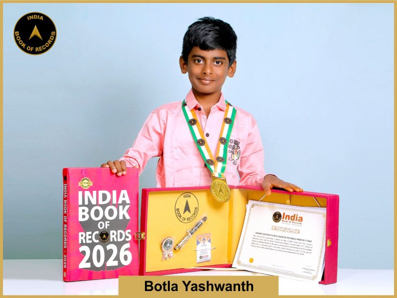 Image of Botla yashwanth, Longest duration to spin a plate on the middle finger by a child.