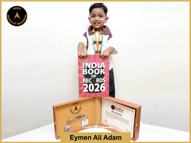 Image of Eymen Ali Adam with IBR Achiever certificate.