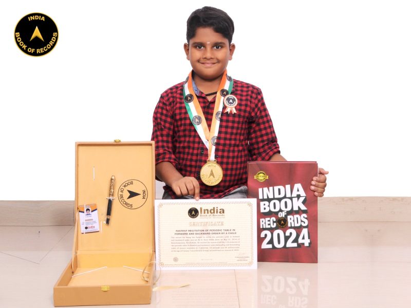 Fastest recitation of periodic table in forward and backward order by a child