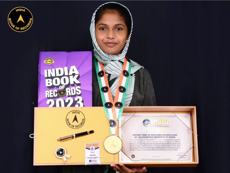 Fastest teen to draw and colour flags of 150 countries on sheets of paper