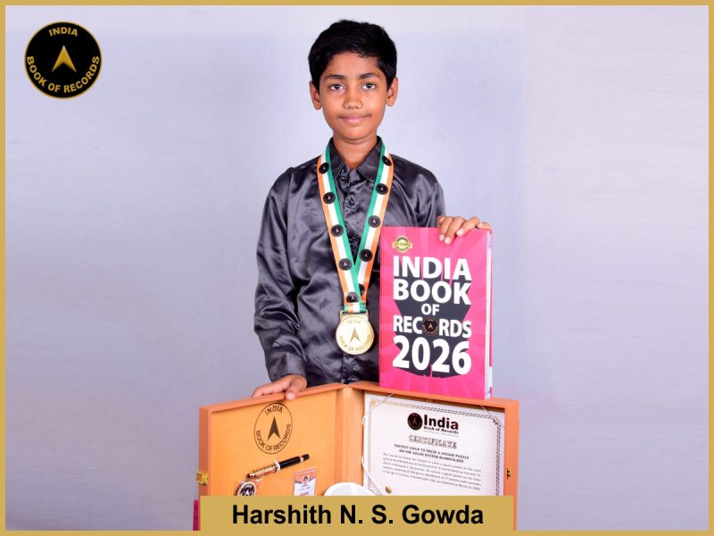 Image of Harshit N S Gowda, Fastest child to solve a jigsaw puzzle on the solar system blindfolded