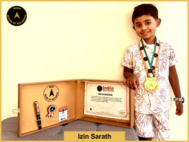 Image of Izin Sarath with IBR certificate.