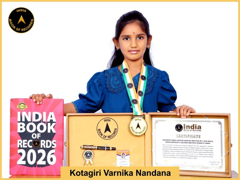 Image of Kotagiri Varnika Nandana, Maximum times Gayatri Mantra recited by a kid while simultaneously solving multiple Rubik's Cubes.