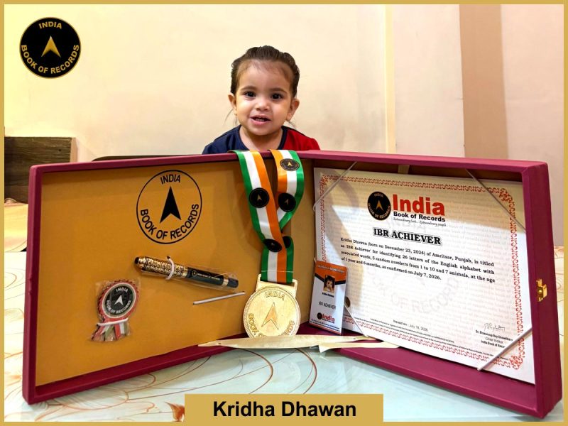 Pic of Kridha Dhawan with IBR Achiever Certificate.