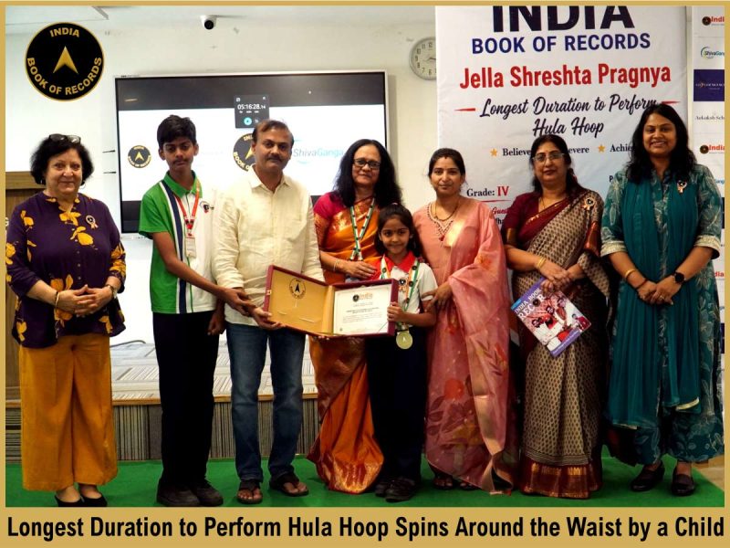 Longest Duration to Perform Hula Hoop Spins Around the Waist by a Child.