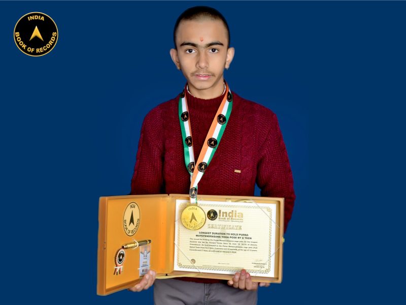 Longest duration to hold Purna Matsyendrasana yoga pose by a teen