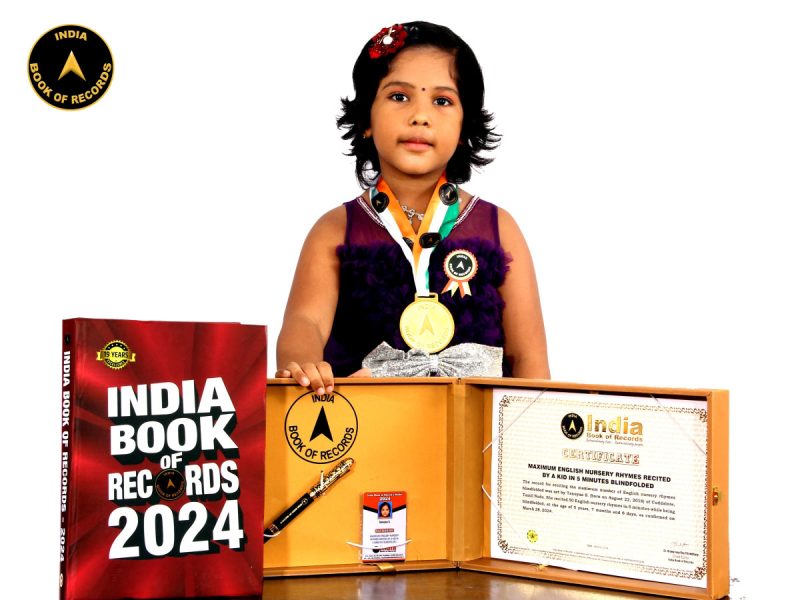Maximum English nursery rhymes recited by a kid in 5 minutes blindfolded