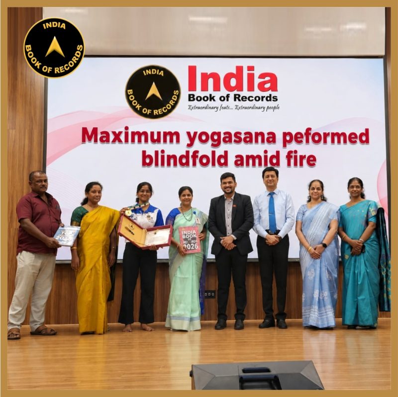 Maximum Yoga Asanas Performed Blindfolded Amid Fire.