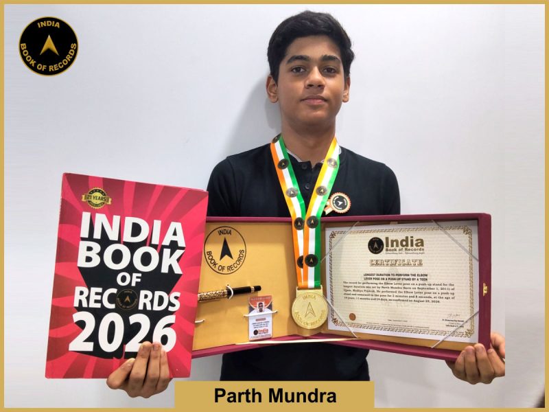 Pic of Parth Mundra, Longest duration to perform the Elbow Lever pose on a push-up stand by a teen.