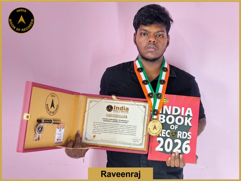 Pic of Raveenraj, Fastest individual to manually assemble a satellite system.