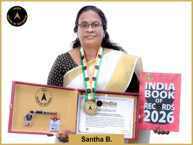 Image of Santha B, Maximum handwritten replicas of religious books in multiple languages made by a sexagenarian.