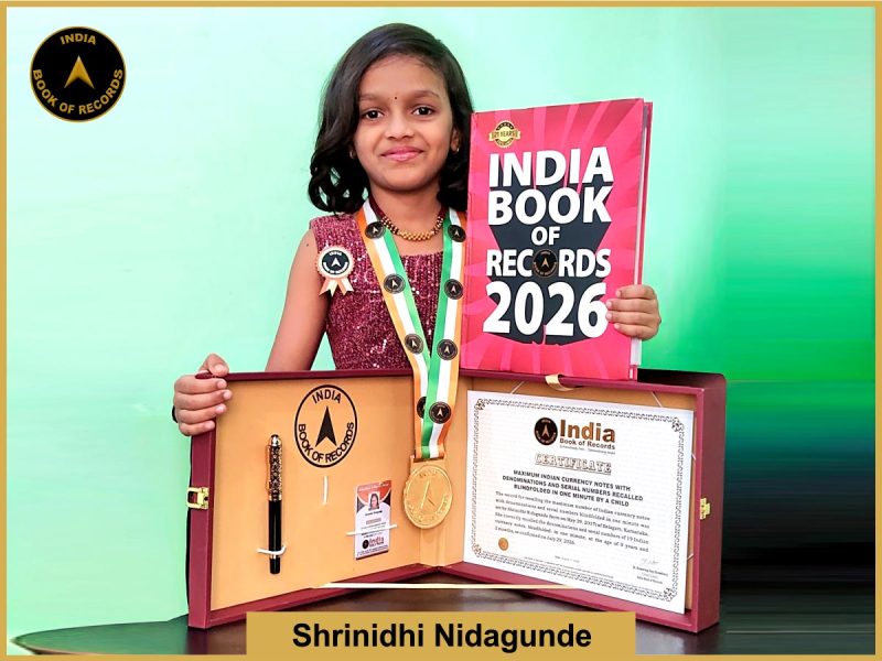 Pic of Shrinidhi Nidagunde, Maximum Indian currency notes with denominations and serial numbers recalled blindfolded in one minute by a child.